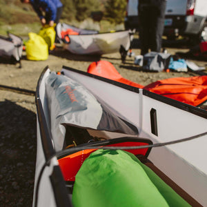 Oru float bag in stern of kayak