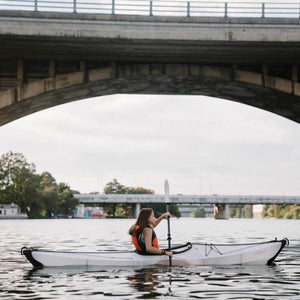 woman paddling in an Oru Kayak Bay ST