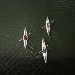 group of Oru Kayak Bay ST in river from above