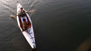 paddling the Oru Kayak Haven solo with dog