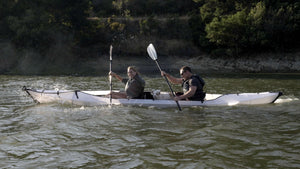 Oru Kayak Haven with two adults and a dog