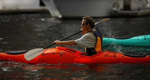 Man paddling a Pakayak Bluefin 142