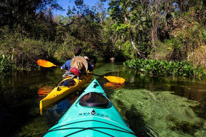 Pakayak Bluefin 142 kayaks on tropical creek adventure