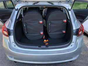 Two Pakayak Bluefin 142s stored in boot of car